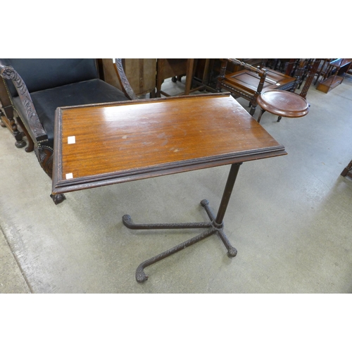 124 - A 19th Century adjustable cast iron and mahogany invalid table