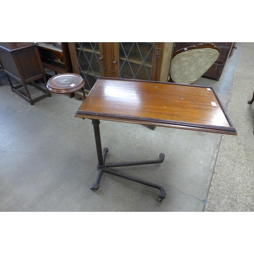 124 - A 19th Century adjustable cast iron and mahogany invalid table