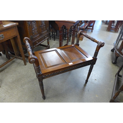 126 - A Regency style mahogany window seat