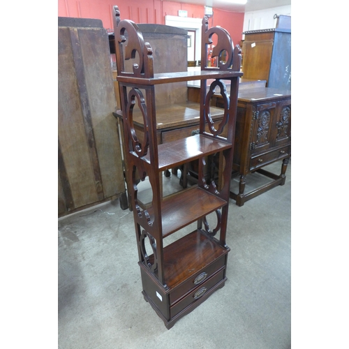 127 - A Chippendale style mahogany four tier wall shelf