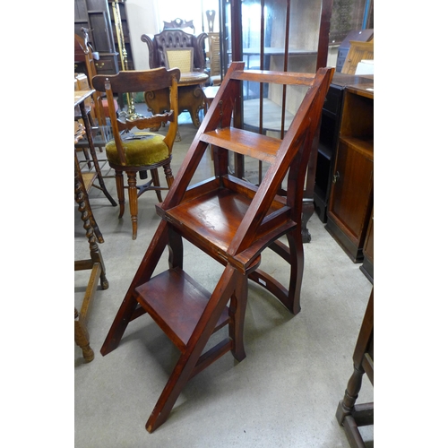 134 - A set of mahogany metamorphic library steps/chair