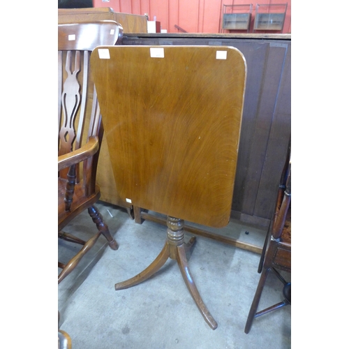 137 - A Victorian mahogany rectangular tilt-top tripod table