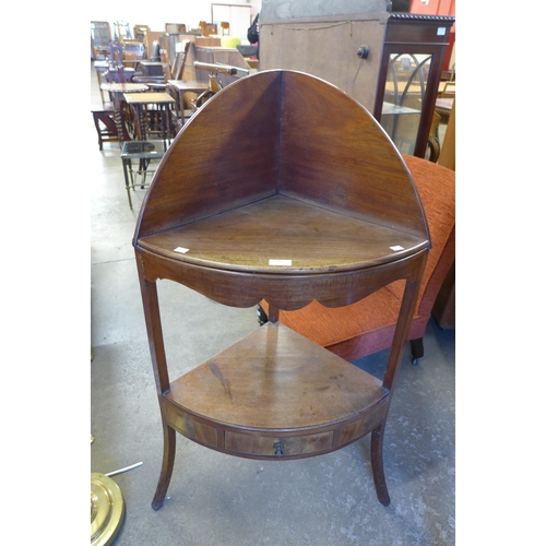 146 - A George III mahogany corner washstand