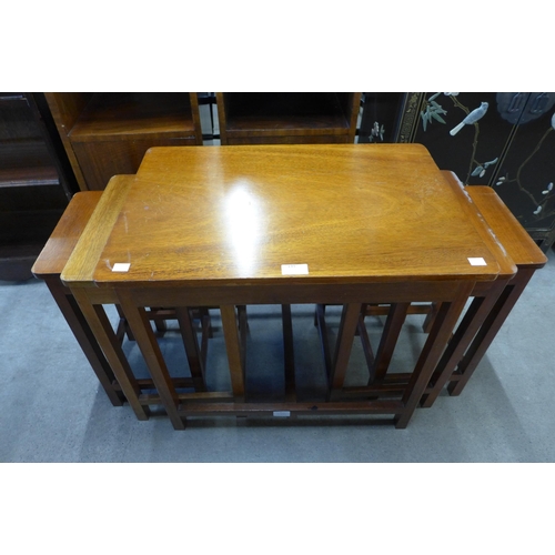 149 - A mahogany nest of tables