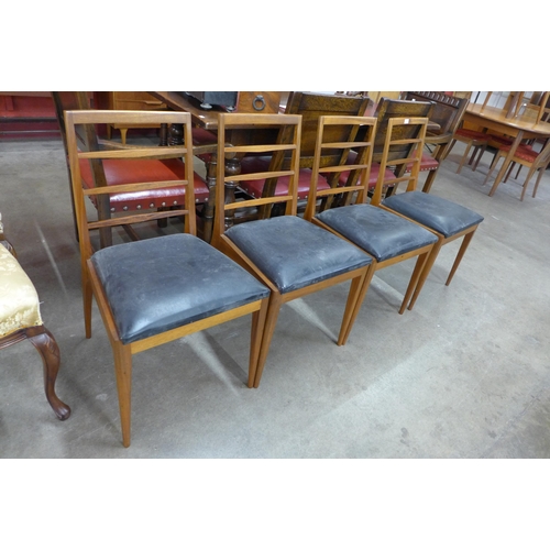 16 - A set of four McIntosh teak dining chairs