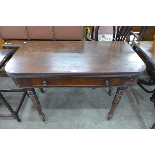 162 - A George IV mahogany fold over tea table