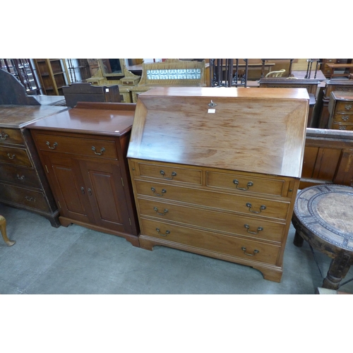 174 - A hardwood bureau and a tallboy