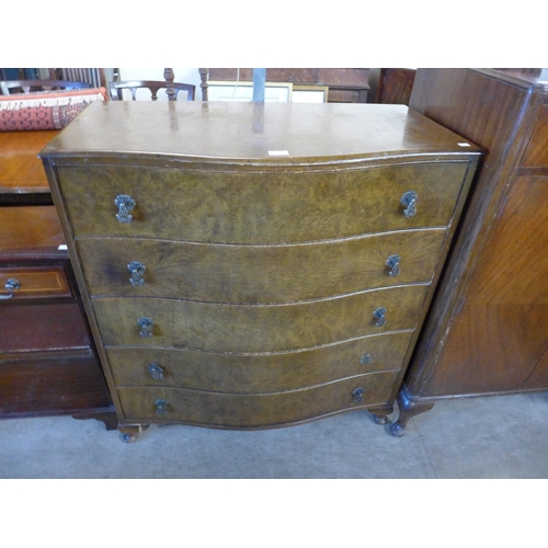 202 - A burr walnut serpentine chest of drawers, a walnut tallboy and an oak dressing table