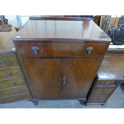 202 - A burr walnut serpentine chest of drawers, a walnut tallboy and an oak dressing table