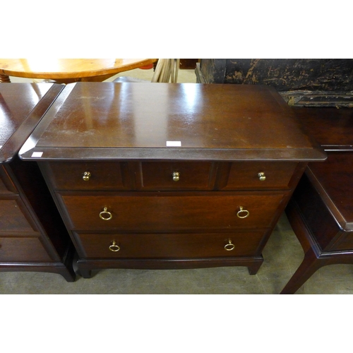 207 - A Stag Minstrel mahogany chest of drawers and dressing chest