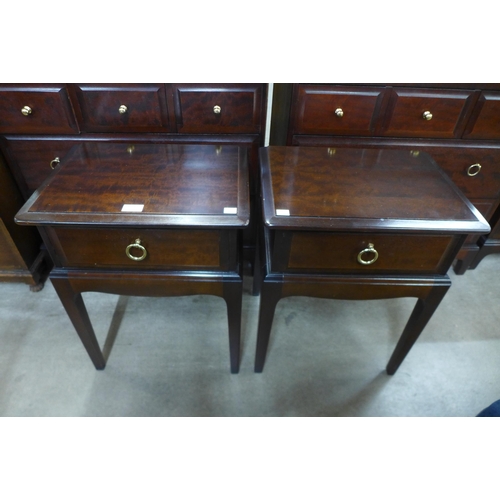 208 - A pair of Stag Minstrel mahogany bedside tables