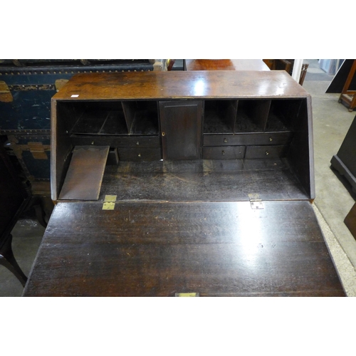 210 - A George III oak bureau