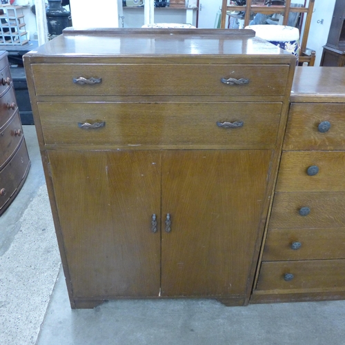 211 - An oak tallboy and two oak chests of drawers