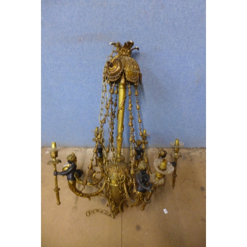 246 - An early 20th Century French bronze and brass chandelier