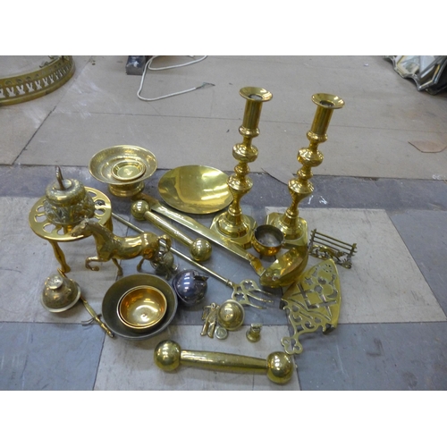 248 - A pair of brass candlesticks and assorted brassware