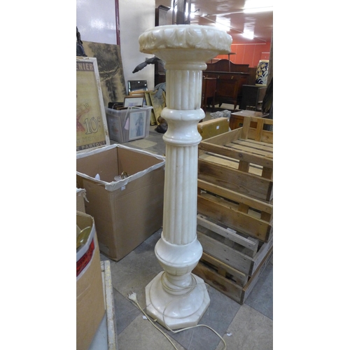 250 - A French alabaster jardiniere stand