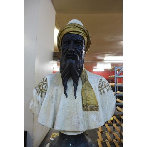 253 - A painted plaster bust of an Arabic man, on pedestal