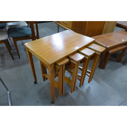 26 - A Poul Hundevad teak nest of tables