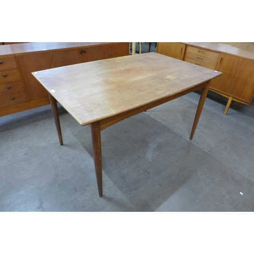 3 - A Danish teak extending dining table