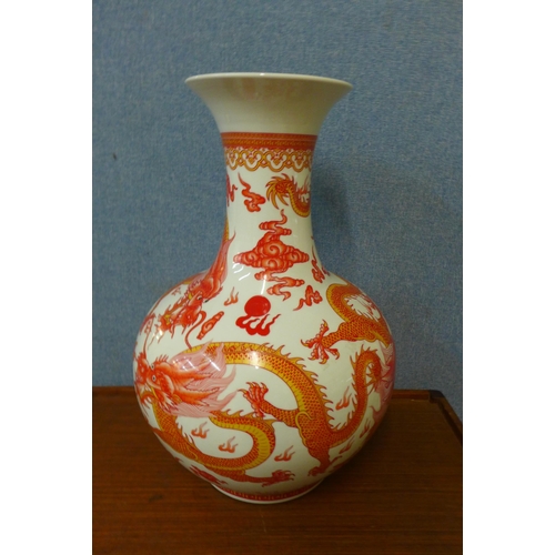 301 - A Chinese white porcelain and red Imperial dragon pattern vase