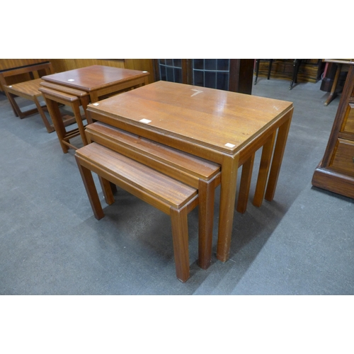 31 - A teak nest of tables