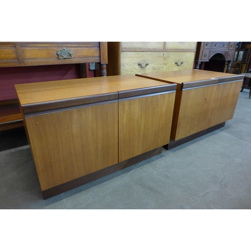 34 - A pair of G-Plan teak two door cupboards