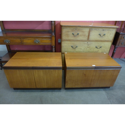 34 - A pair of G-Plan teak two door cupboards