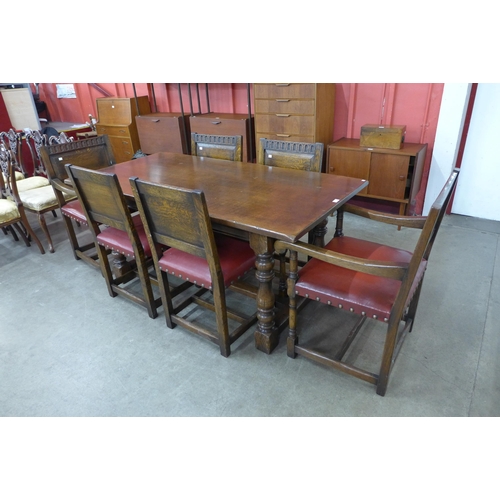 58 - An Ipswich oak refectory table ( 76cms h, 168cms l, 84cms w) and six chairs