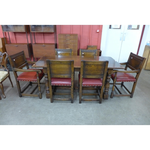 58 - An Ipswich oak refectory table ( 76cms h, 168cms l, 84cms w) and six chairs