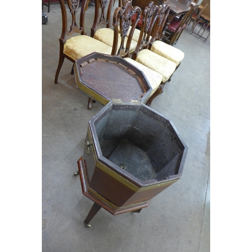 60 - A George III mahogany and brass banded octagonal wine cooler