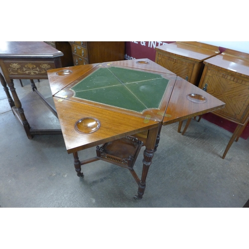 63 - A late Victorian mahogany envelope card table