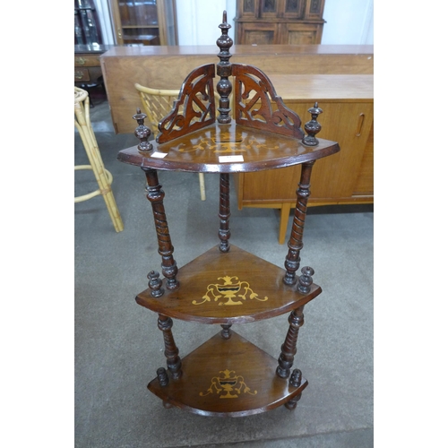 81 - A Victorian marquetry inlaid walnut three tier corner whatnot