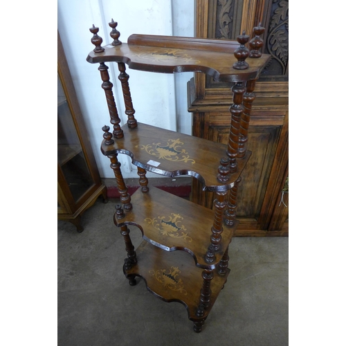 82 - A Victorian marquetry inlaid walnut four tier whatnot