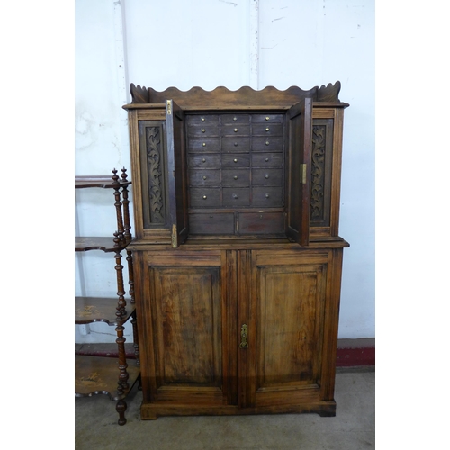 83E - A late 19th/early 20th Century French carved beech fitted six door cupboard