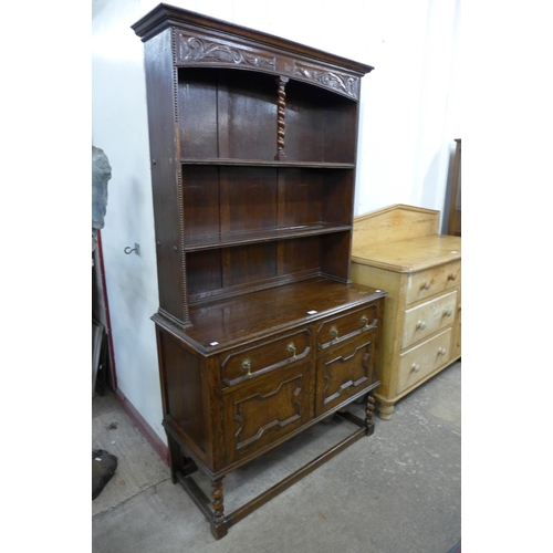 83F - An early 20th Century oak geometric moulded dresser