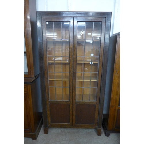 85 - An early 20th Century oak two door bookcase