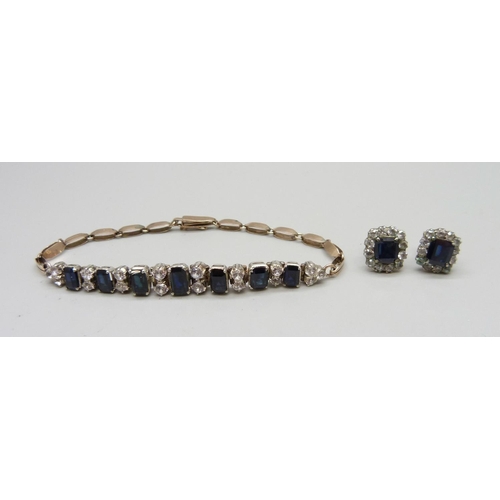 1014 - A yellow metal, blue and white sapphire bracelet and earrings, 14.1g