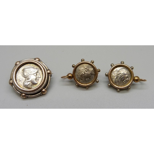 1017 - A pair of silver coin and 9ct gold earrings and matching brooch