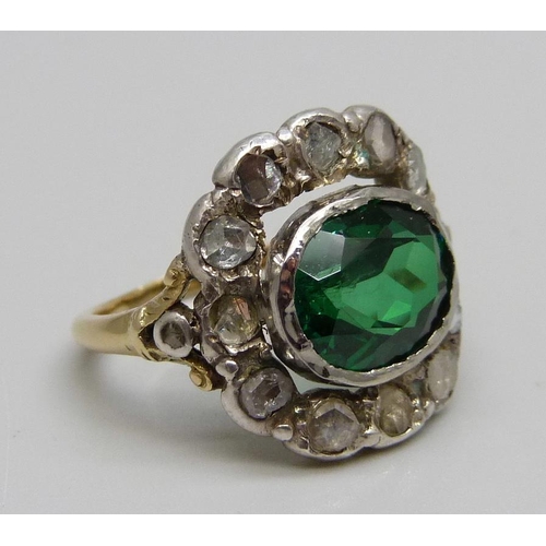 1035 - An old cut diamond and green stone yellow metal ring, white metal mounts, 6.1g, N