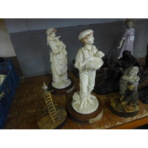 1057 - A collection of wooden, china and resin figures **PLEASE NOTE THIS LOT IS NOT ELIGIBLE FOR POSTING A... 