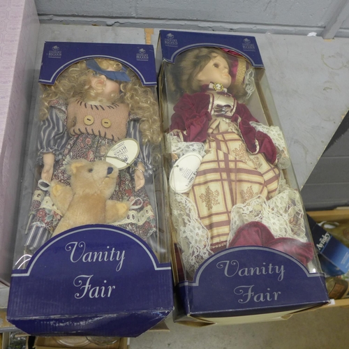 1070 - A collection of boxed porcelain and other dolls **PLEASE NOTE THIS LOT IS NOT ELIGIBLE FOR POSTING A... 