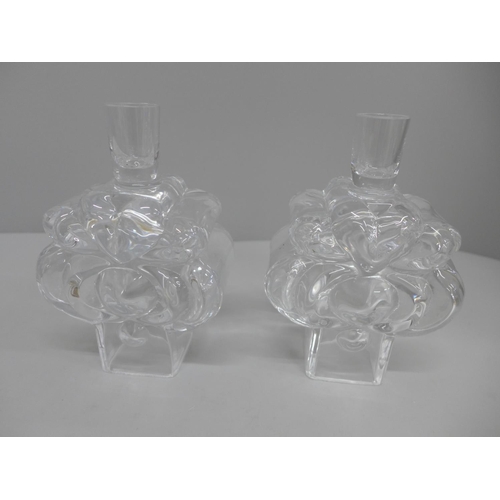 618 - A pair of signed 1970s Swedish art glass signed candle holders in scroll and heart shaped form by La... 