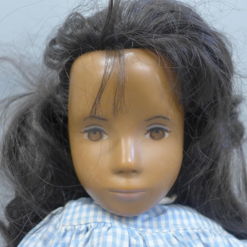 659 - A rare version 1960s Sasha doll with NP (no philtrum) with brown wig, Gingham dress, white leather s... 