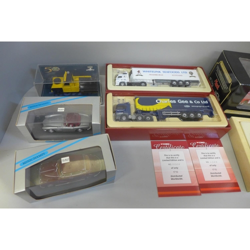 663 - A collection of Corgi and Minichamps model vehicles, boxed