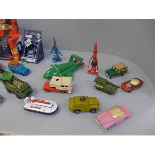 679 - A collection of die-cast toys including Thunderbirds, Captain Scarlet and Dr Who  eight Thunderbirds... 