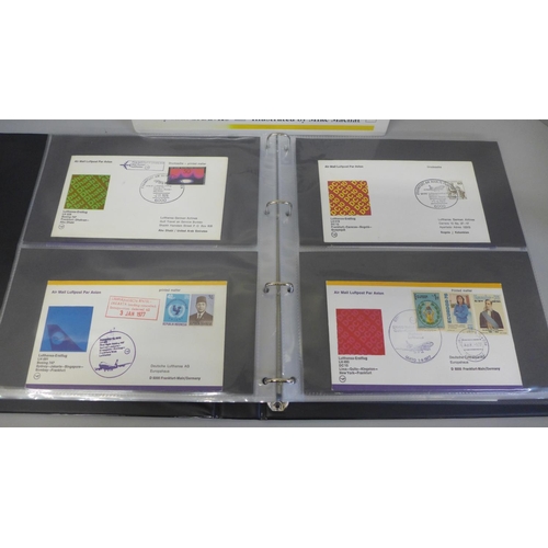 688A - Stamps; an album of 100 Lufthansa first flight covers together with a book on the history of Lufthan... 