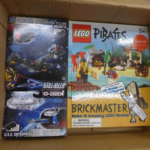 714 - A collection of loose Lego sets mostly from the 1970's; a boxed Pirates Lego set and four Kre-o Star... 