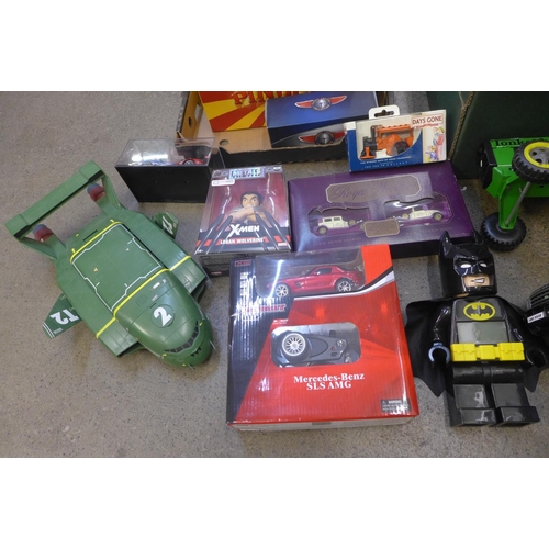 721 - Two boxes of toys and model vehicles, some boxed, including Tonka and Thunderbirds