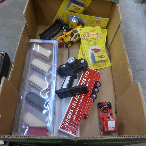 721 - Two boxes of toys and model vehicles, some boxed, including Tonka and Thunderbirds