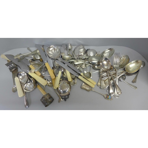 735 - A collection of stainless steel and silver plated cutlery